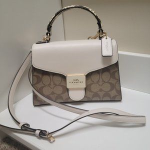 Authenticated Coach Satchel.  Signature Canvas with Animal print.
